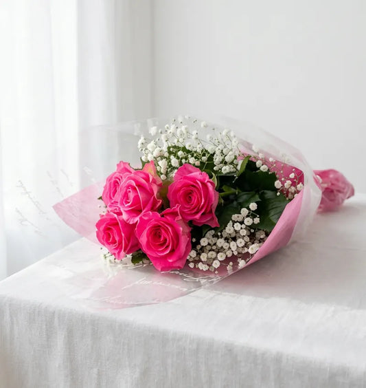 ピンクのバラとかすみ草の花束Sサイズ